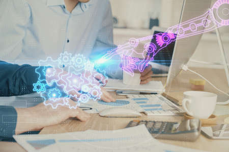 Double exposure of technology hologram with man working on computer background. Concept of big data.