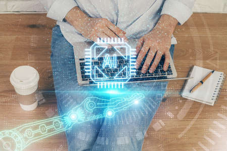 Multi exposure of data internet theme hologram with man working on computer on background. Concept...
