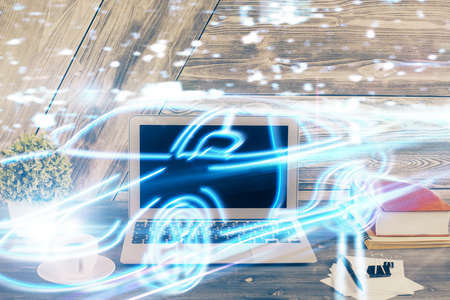 Desktop computer background in office with automobile hologram drawing. Multi exposure. Tech...