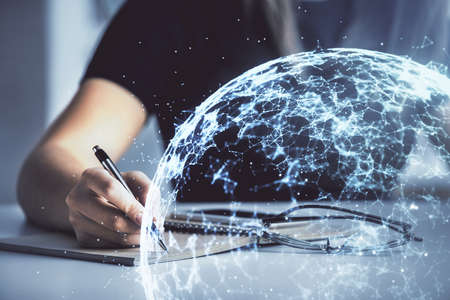 Social network theme hologram over hands taking notes background. Concept of global international people connect. Double exposureの写真素材