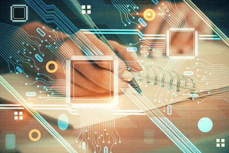 Double exposure of writing hands on background with data solution hologram on front. Technology concept. Close upの写真素材