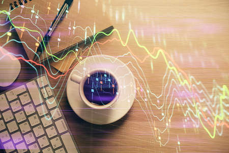 Multi exposure of forex chart drawing and work table top veiw. Concept of financial analysis.