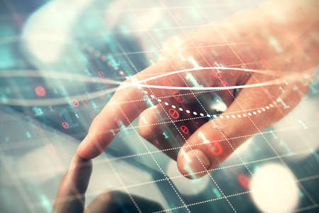 Multi exposure of man's hands holding and using a phone and financial chart drawing. Market analysis...