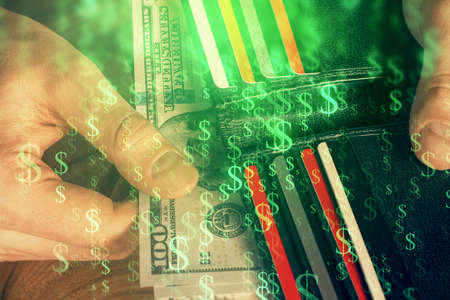 Multi exposure of forex graph drawing hologram and USA dollars bills and man hands. Technical...
