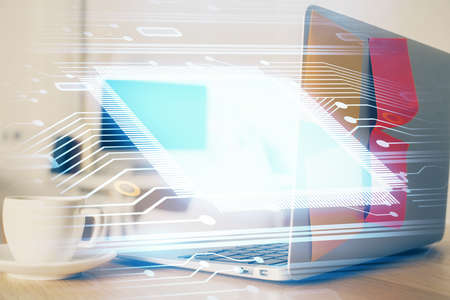 Multi exposure of desktop computer and technology theme hologram. Concept of software development.