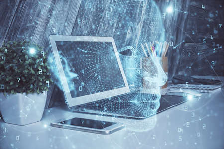 Multi exposure of work table with computer and brain hologram. Brainstorm concept.