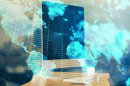 Multi exposure of business theme icons and table with computer background. Concept of success.の写真素材