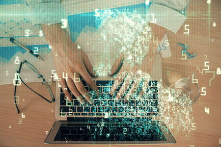 Businessman with computer background with technology theme hologram. Concept of big data. Double...