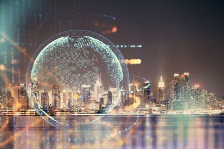 Map and data theme hologram on city view with skyscrapers background double exposure. International technology in business concept.の写真素材