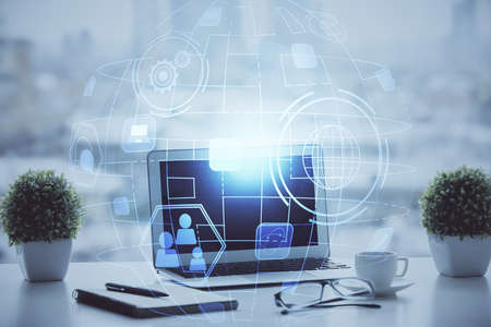 Computer on desktop with social network hologram. Double exposure. Concept of international people...