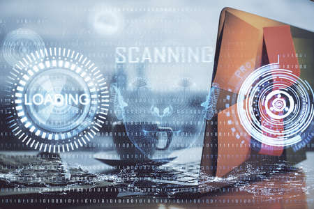 Double exposure of laptop computer and technology theme hologram. Concept of freelance work.