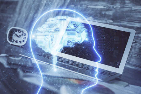Multi exposure of work space with computer and human brain hologram. Brainstorm concept.