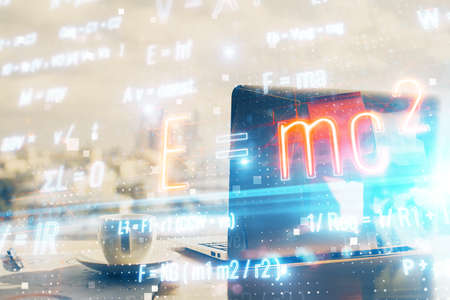 Desktop computer background and formula hologram writing. Double exposure. Education concept.