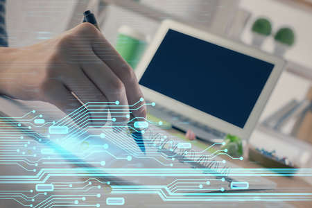 Double exposure of hands making notes with digital coding icons. Computer learning concept.