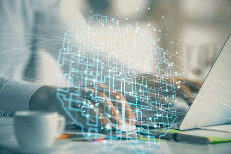 Man typing on keyboard background with brain hologram. Concept of big Data.