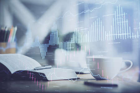 Multi exposure of forex graph drawing and desktop with coffee and items on table background. Concept...