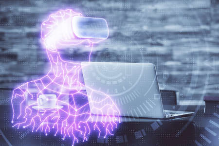 Computer on desktop with AR theme icon. Multi exposure. Concept of augmented reality.