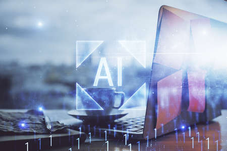 Double exposure of laptop computer and technology theme hologram. Concept of freelance work.の写真素材