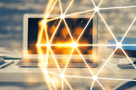 Computer on desktop with social network theme icon. Multi exposure. Concept of international connections.の写真素材