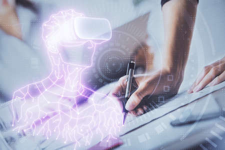 AR hologram over hands taking notes background. Concept of augmented reality. Double exposure