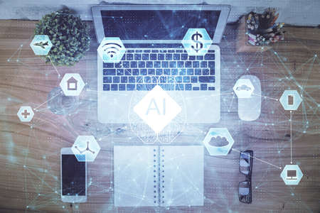 Double exposure of data theme drawing hologram over topview work table background with computer. Concept of technology.の写真素材
