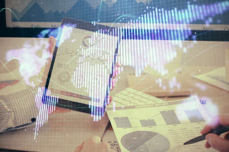 Double exposure of mans hands holding and using a phone and international business theme drawing.の写真素材
