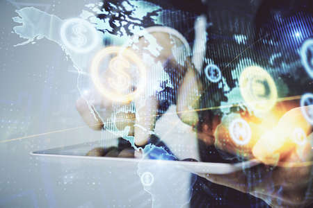 Multi exposure of mans hands holding and using a phone and financial chart drawing. Market analysis...