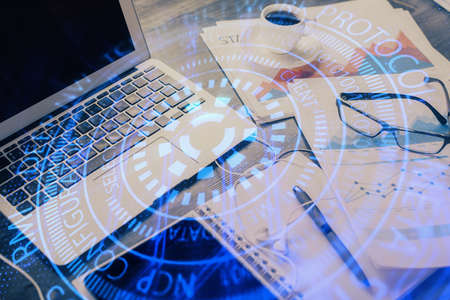 Double exposure of table with computer on background and data theme drawing. Concept of innovation.