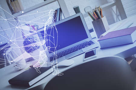 Desktop computer background in office and start up theme hologram drawing. Double exposure. Startup...