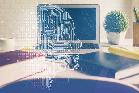 Double exposure of work space with computer and human brain drawing hologram. Brainstorm concept.