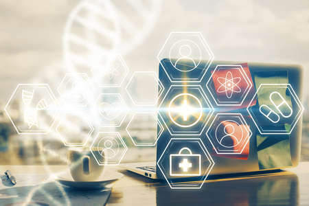 Desktop computer background and DNA drawing. Double exposure. Science concept.