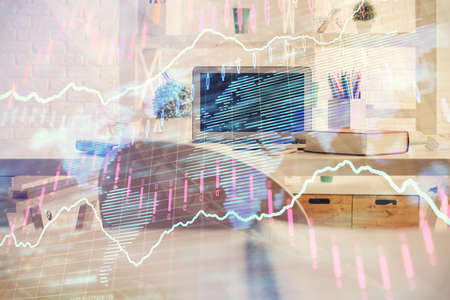 Double exposure of financial graph drawing and office interior background. Concept of stock market.の写真素材