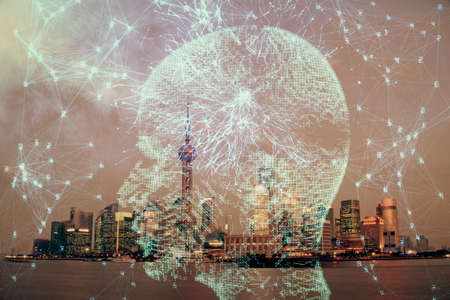 Brain hologram drawing on city scape background Double exposure. Brainstorming concept.の写真素材