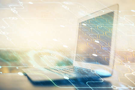 Double exposure of desktop with computer on background and tech theme drawing. Concept of big data.