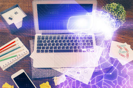 Computer on desktop with AR theme icon. Multi exposure. Concept of augmented reality.の写真素材