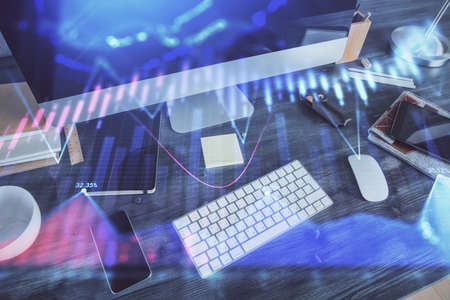Multi exposure of forex graph and work space with computer. Concept of international online trading.