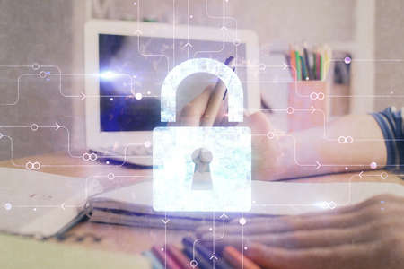 Double exposure of womans hands writing with lock icon. Concept of security and protection of data