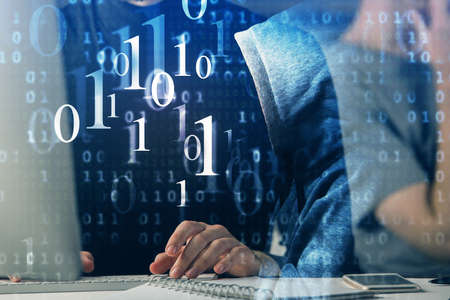 Multi exposure of data internet theme hologram with man working on computer on background. Concept...