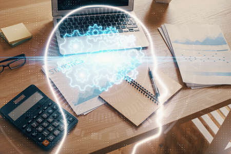 Double exposure of desktop computer and human brain drawing hologram. Ai concept.