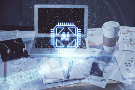 Double exposure of laptop computer and technology theme hologram. Concept of freelance work.