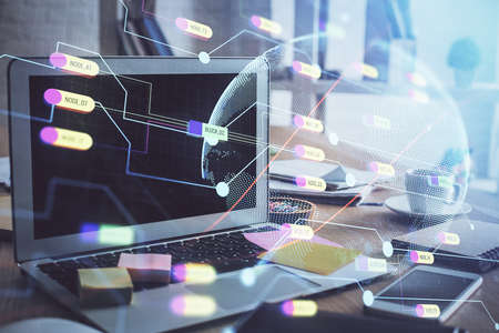 Multi exposure of table with computer and world map hologram. International data network concept.
