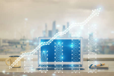 Forex market graph hologram and personal computer on background. Multi exposure. Concept of...