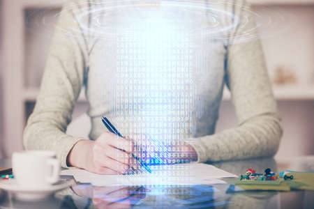 Double exposure of writing hand on background with data solution technology hologram. Ai concept.