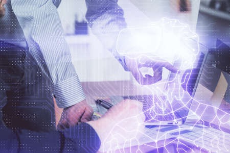 AR hologram with man working on computer on background. Augmented reality concept. Double exposure.