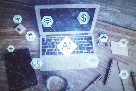Double exposure of data hologram sketch over study table background with computer. Concept of Ai....
