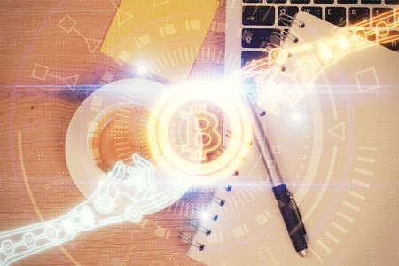 Blockchain theme hologram drawings over computer on the desktop background. Top view. Multi exposure. Concept of cryptoeconomy.の写真素材
