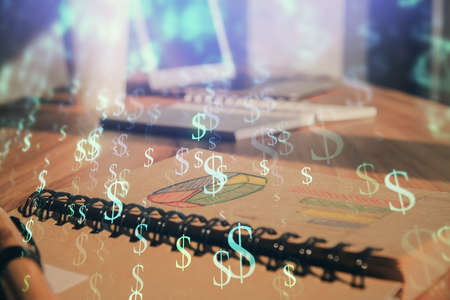 Double exposure of financial graph drawings and desk with open notebook background. Concept of forex marketの写真素材