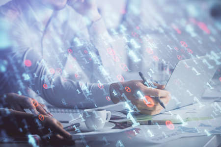 Double exposure of man and woman working together and technology theme drawing hologram. Big data...