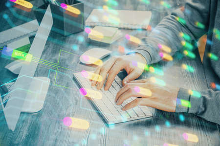 Double exposure of tech drawings with hands working on computer background. Concept of innovation.の写真素材