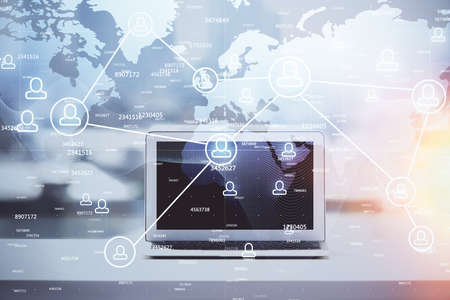 Computer on desktop with social network hologram. Double exposure. Concept of international people...